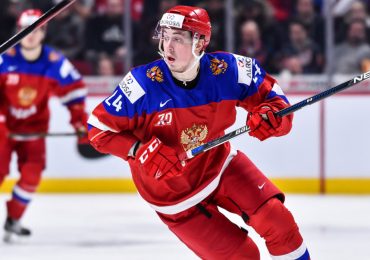Russian hockey player sentenced in military bribery case